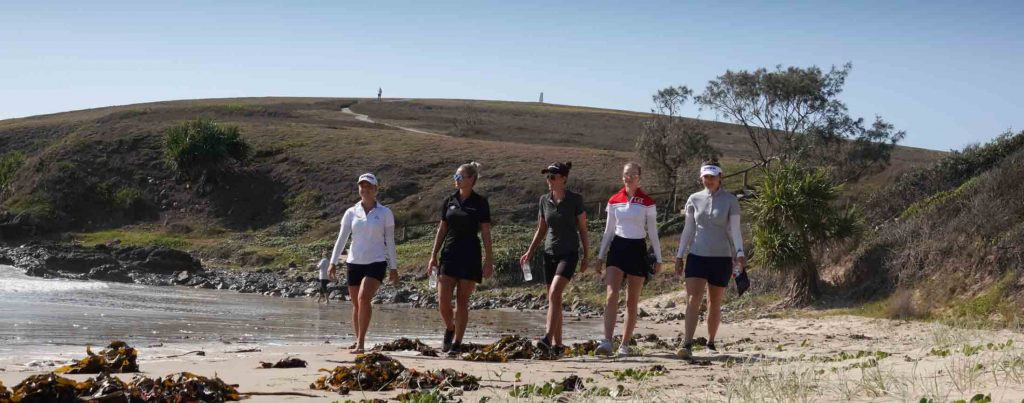 Walking along Coffs Coast Beach