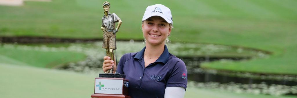 Stephanie Kyriacou holding the Australian Ladies Classic trophy