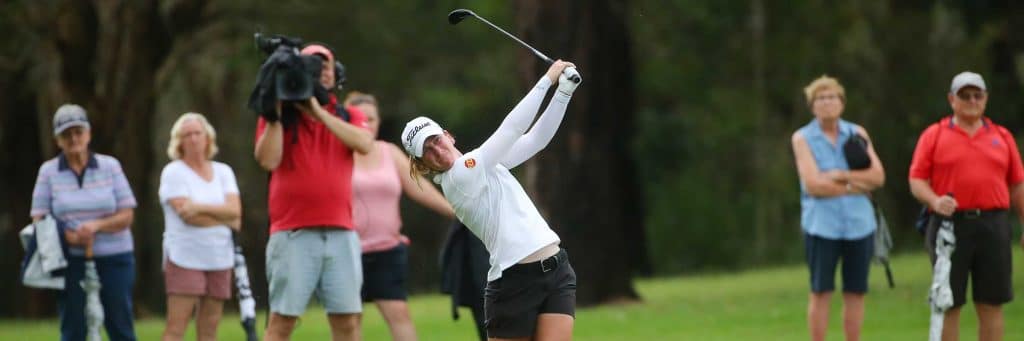 Amelia Mehmet Grohn hits a golf ball